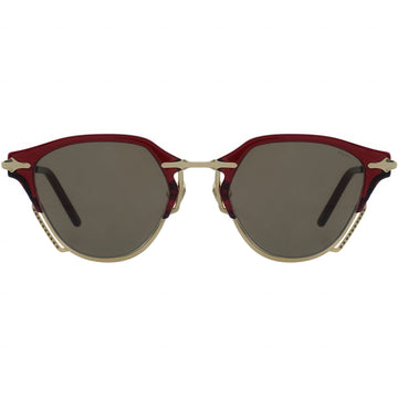 Sunglasses with red and gold frame on a white background