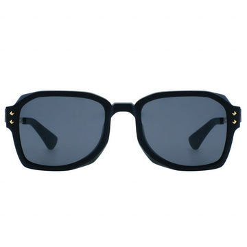 Black sunglasses with gold accents on a white background