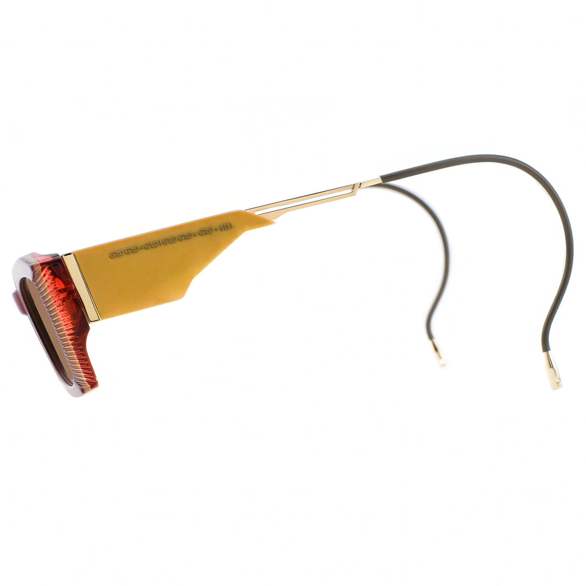 Sunglasses with a yellow frame and gold cable on a white background