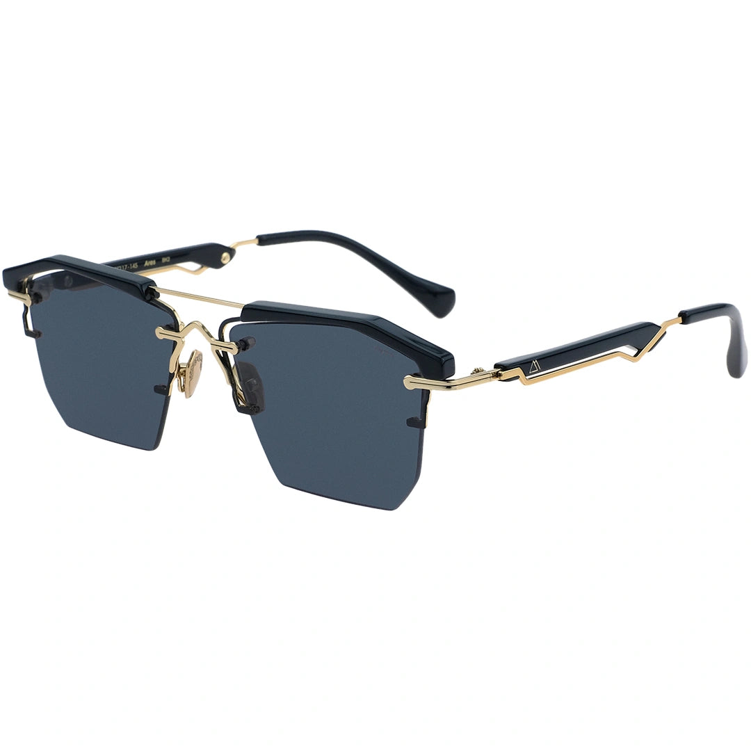 Sunglasses with black and gold frame on a white background