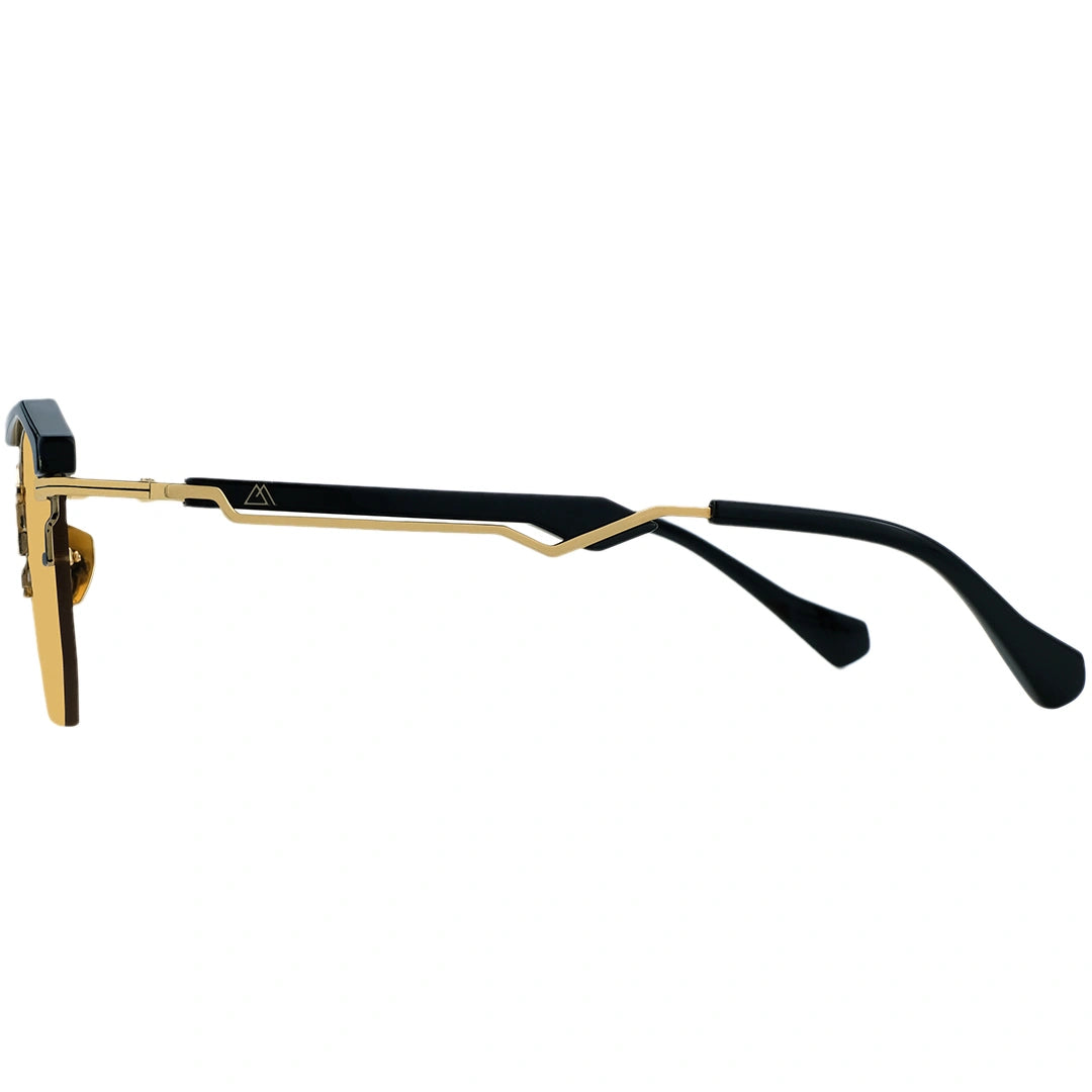 Gold and black eyeglasses on a white background