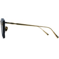 Sunglasses with gold frame and black arms on a white background