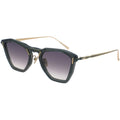 Side view of dark teal green hexagonal cat-eye sunglasses with gradient purple lenses fading from dark to light, black bottom accents, and gold-tone metal twisting temples.